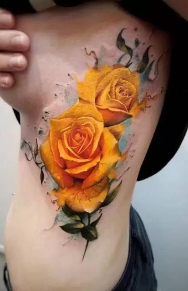 Watercolor yellow rose side tattoo