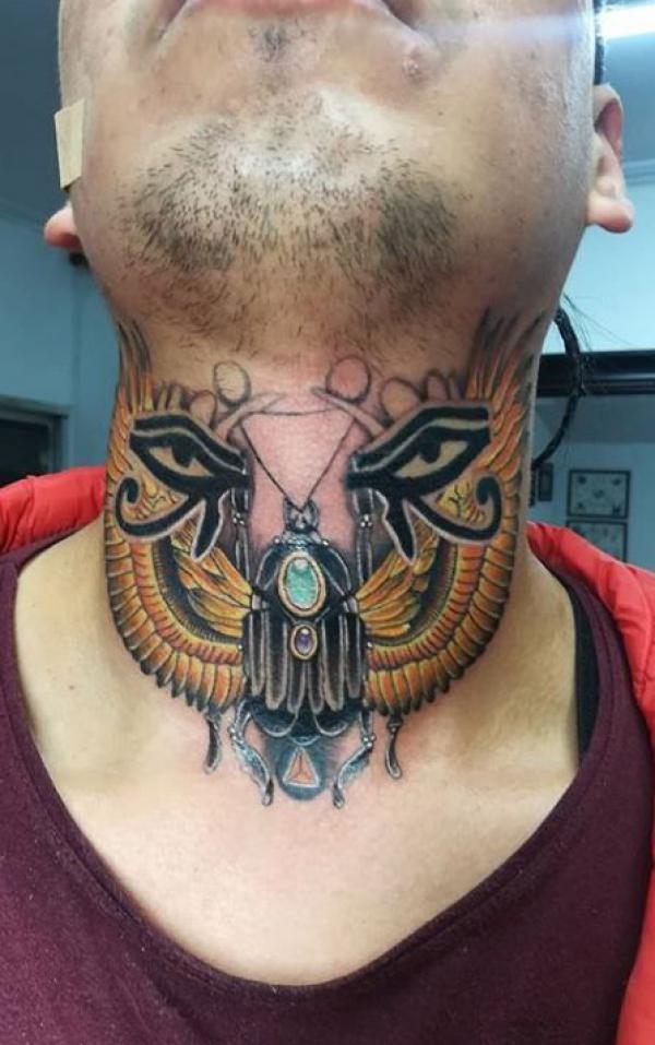 Wings tattoo with eye of Horus and eye of Ra