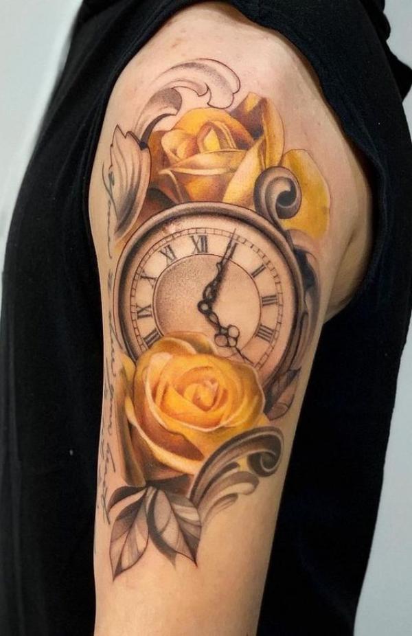Yellow rose and clock tattoo