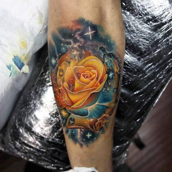 Yellow rose and galaxy tattoo