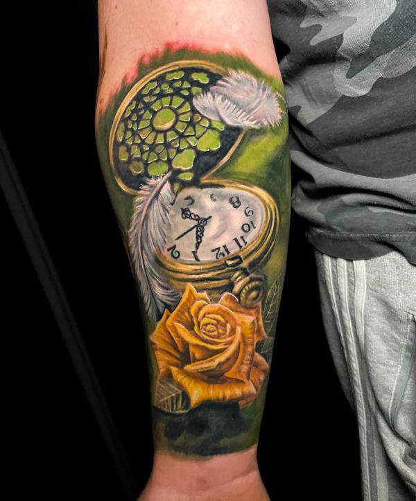 Yellow rose and pocket watch tattoo