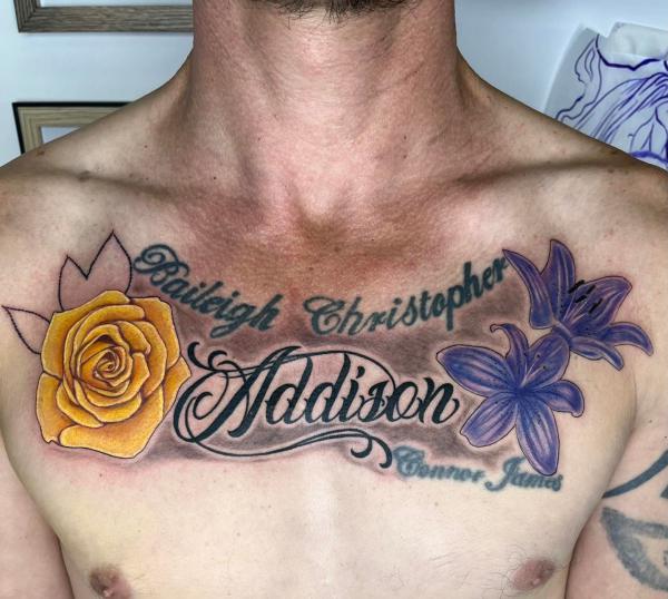 Yellow rose and purple lily tattoo