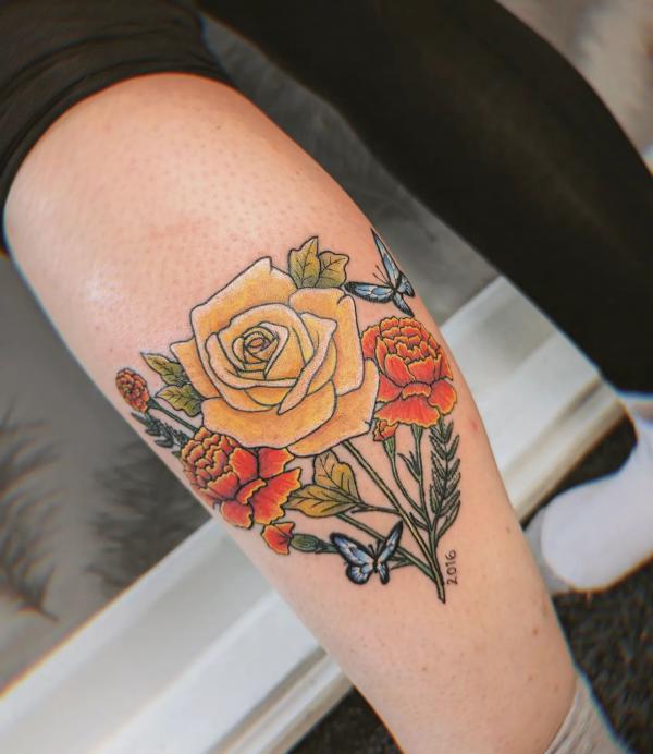 Yellow rose anf red pony flowers with butterfly