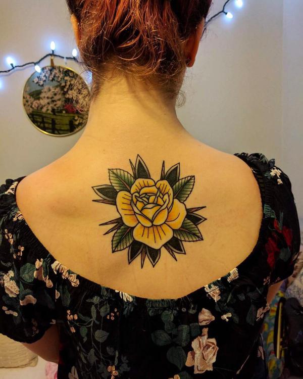 Yellow rose back tattoo traditional