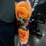 Yellow rose skull tattoo