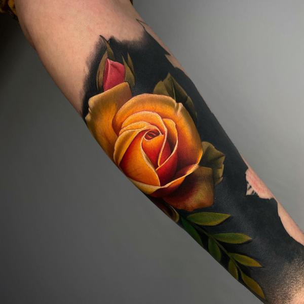 Yellow rose tattoo forearm