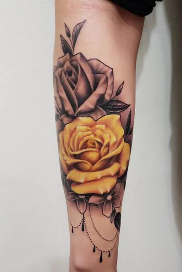 Yellow rose with a black and grey rose