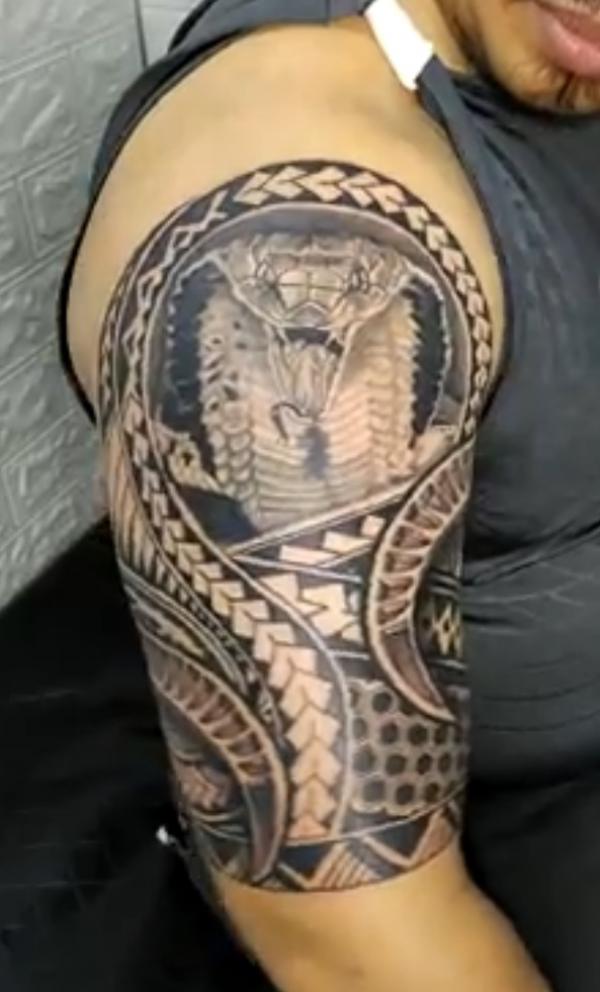 Polynesian cobra tattoo