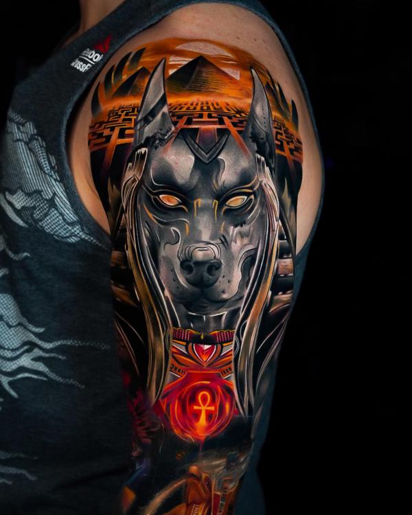 Anubis and Ankh half sleeve tattoo