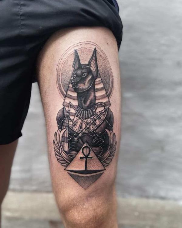 Anubis and Ankh thigh tattoo