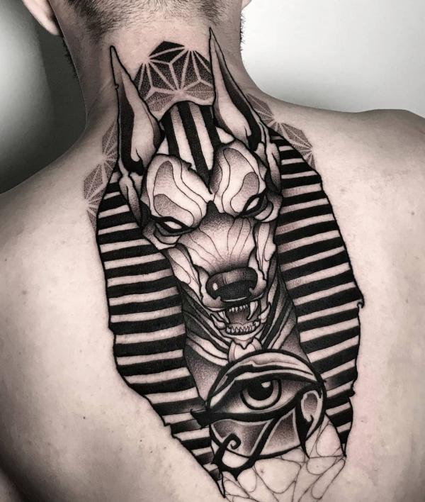 Anubis and Eye of Ra back tattoo