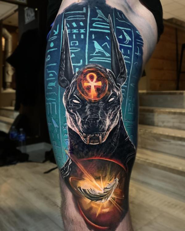 Anubis and Hieroglyphics with feather tattoo