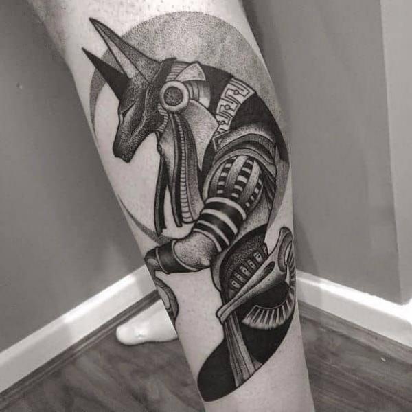 Anubis and crescent moon tattoo
