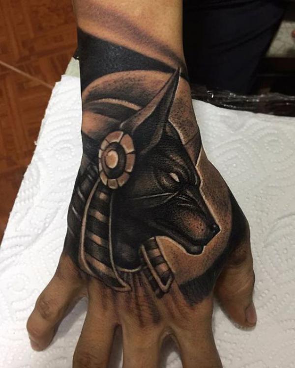 Anubis hand tattoo