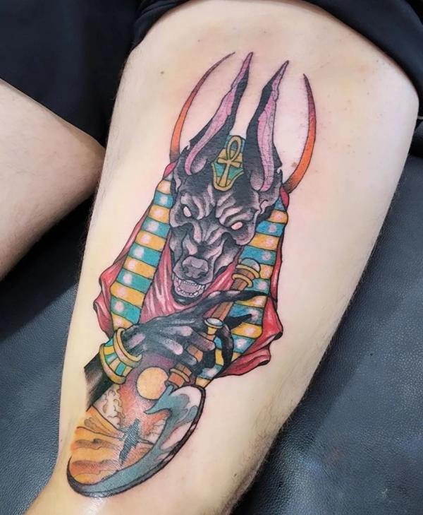 Anubis holding Khopesh thigh tattoo