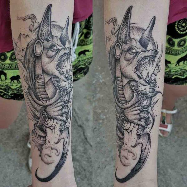 Anubis holding was scepter lower leg tattoo