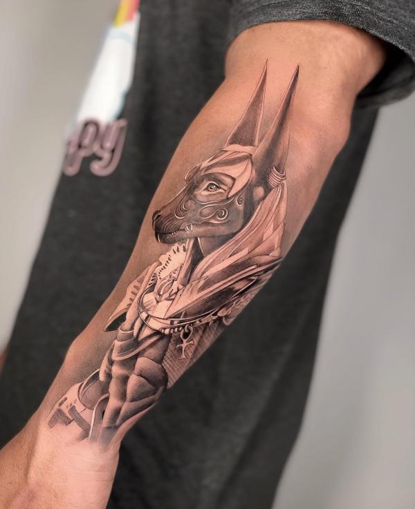Anubis outer forearm tattoo