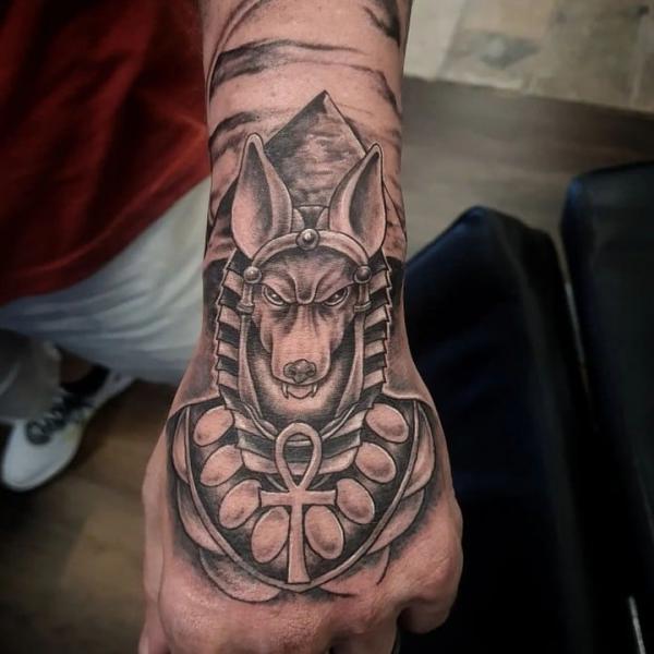 Anubis with Ankh hand tattoo