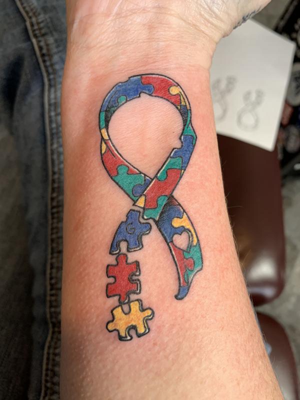 Autism puzzle ribbon tattoo