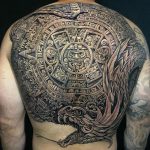 Aztec calendar and Quetzalcoatl tattoo