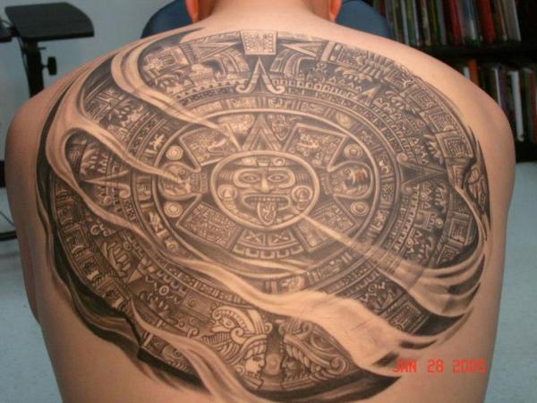 Aztec calendar and wind tattoo on back