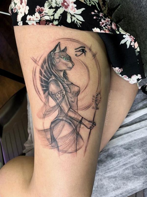 Bastet holding sistrum thigh tattoo
