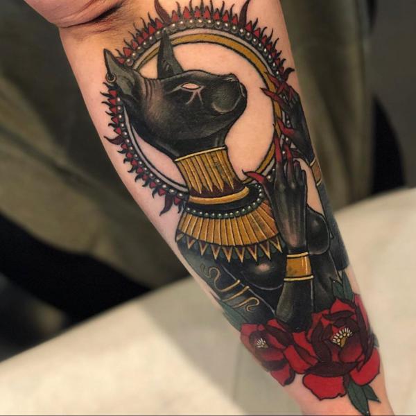 Bastet with rose tattoo traditional
