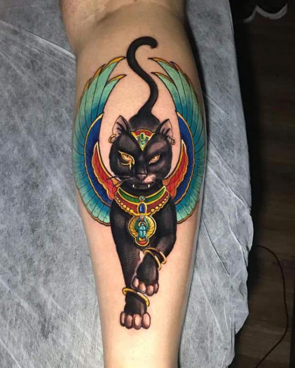 Bastet with wings calf tattoo