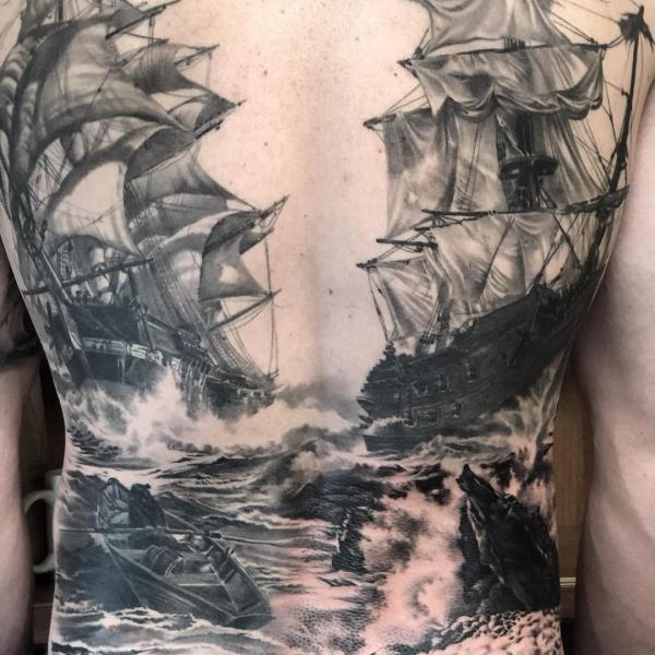 Black and grey shipwreck full back tattoo