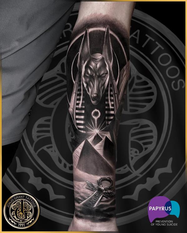 Blackwork Anubis and Pyramids with Ankh tattoo