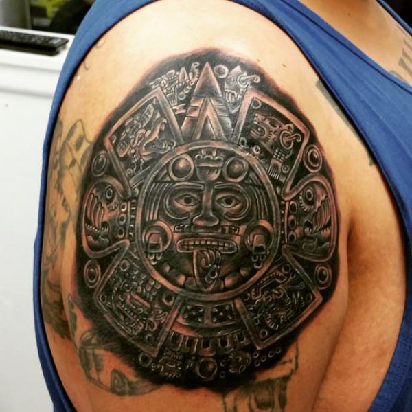 Blackwork Aztec tattoo on shoulder