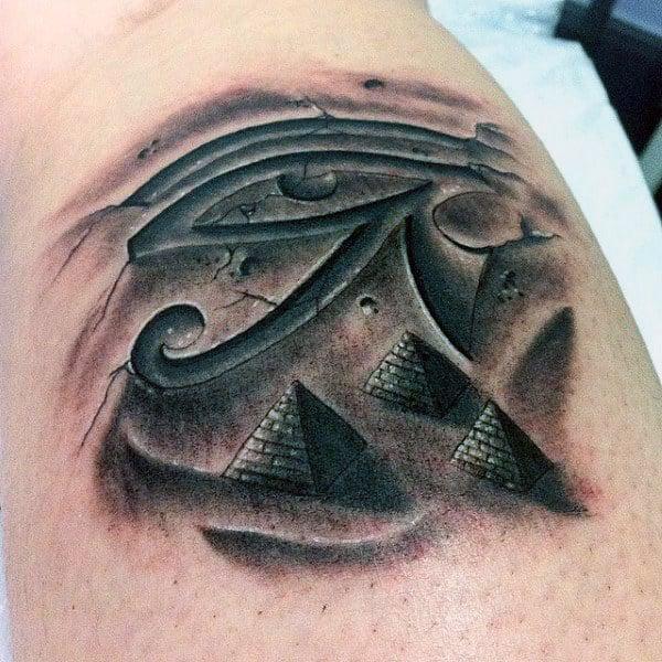 Blackwork pyramid and Eye of Ra tattoo