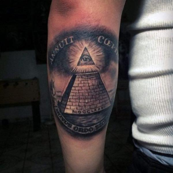 Blackwork pyramid tattoo with words Novus Ordo SecloRuM tattoo