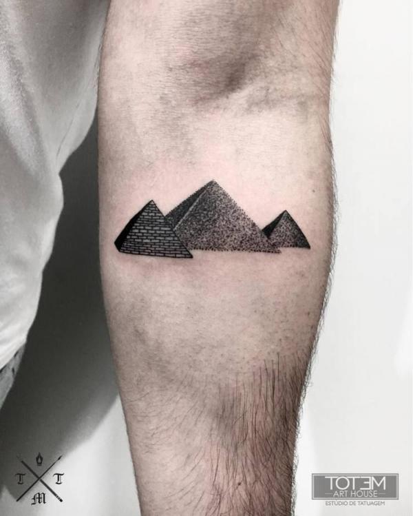 Blackwork three pyramids below elbow