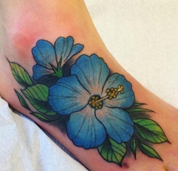 Blue hibiscus foot tattoo