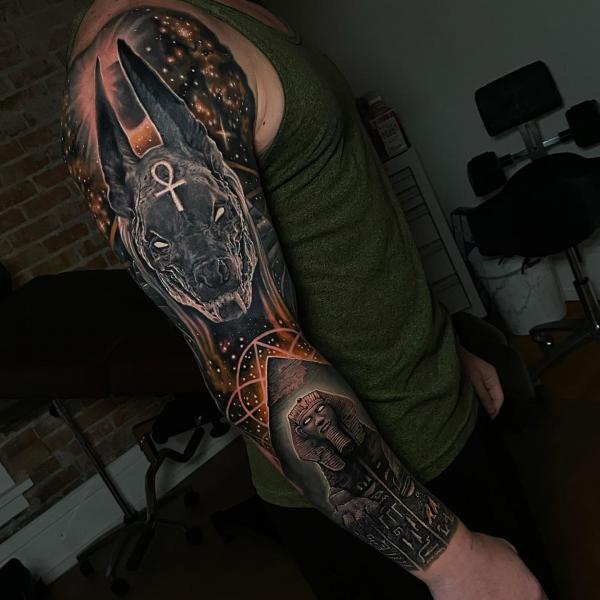 Celestial Anubis and Sphinx full sleeve tattoo