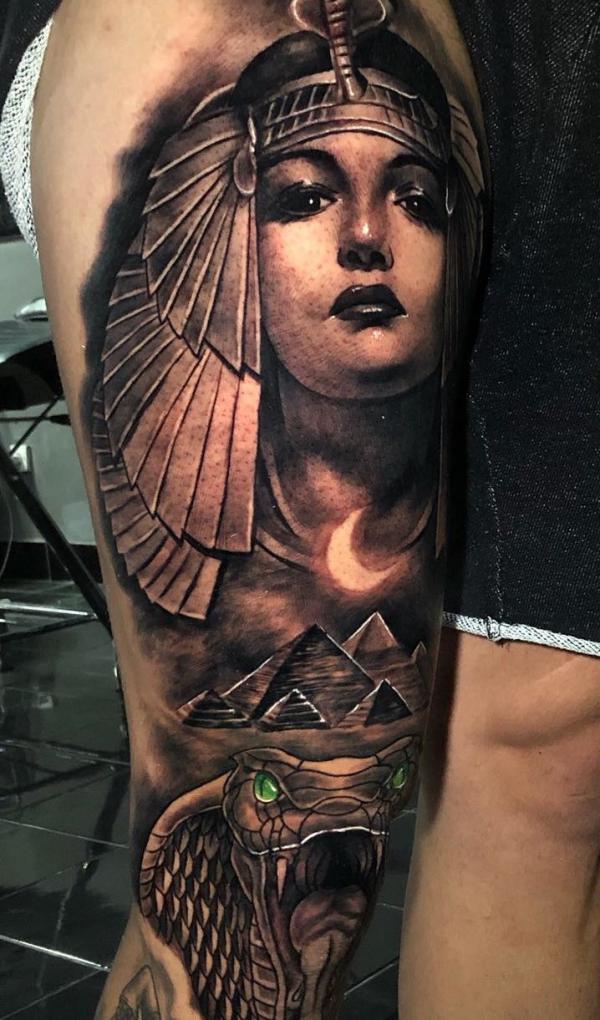 Cleopatra Pyramids and cobra tattoo