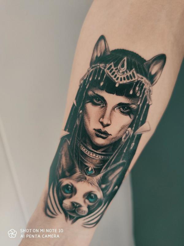 Cleopatra and Egyptian cat forearm tattoo