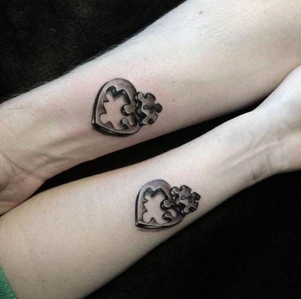Couple heart tattoo with missing puzzle