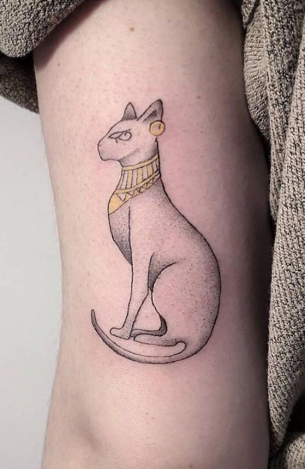 Dainty Bastet outline with eye of Horus tattoo