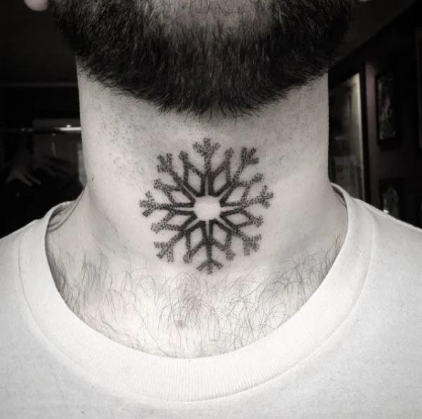 Dotwork snowflake throat tattoo