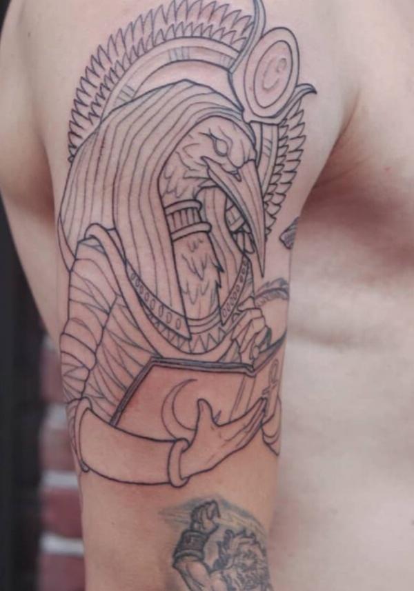 Egyptian God Thoth writing quarter sleeve tattoo
