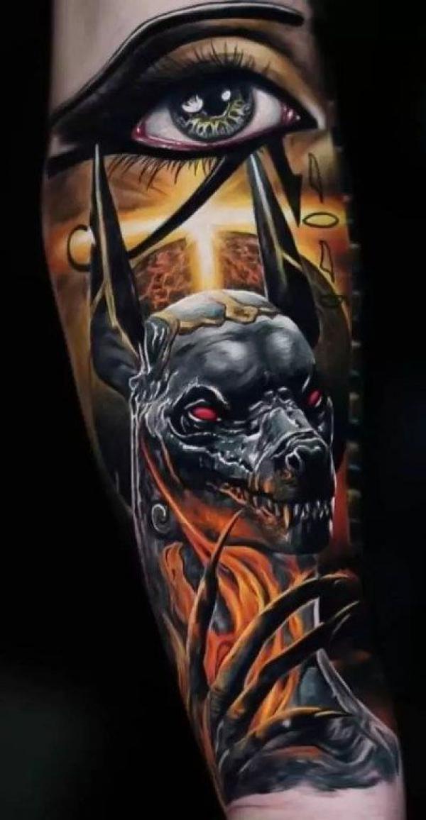 Eye of Ra and Anubis forearm tattoo
