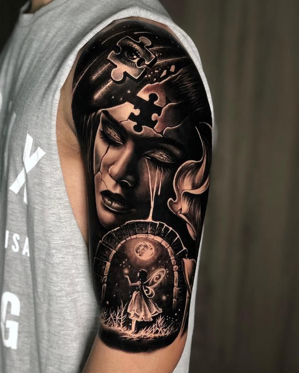Fairy and puzzle face tattoo