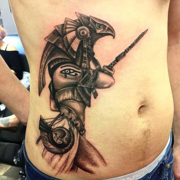 Falcon warrior Horus with Eye of Horus tattoo