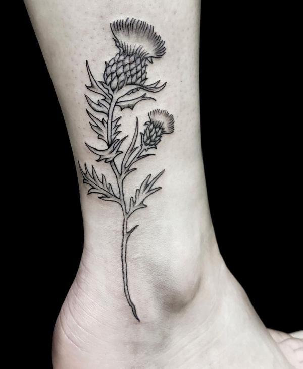 Fineline thistle ankle tattoo