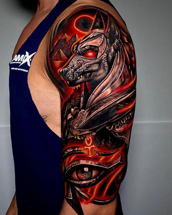 Flaming Anubis and Eye of Horus tattoo