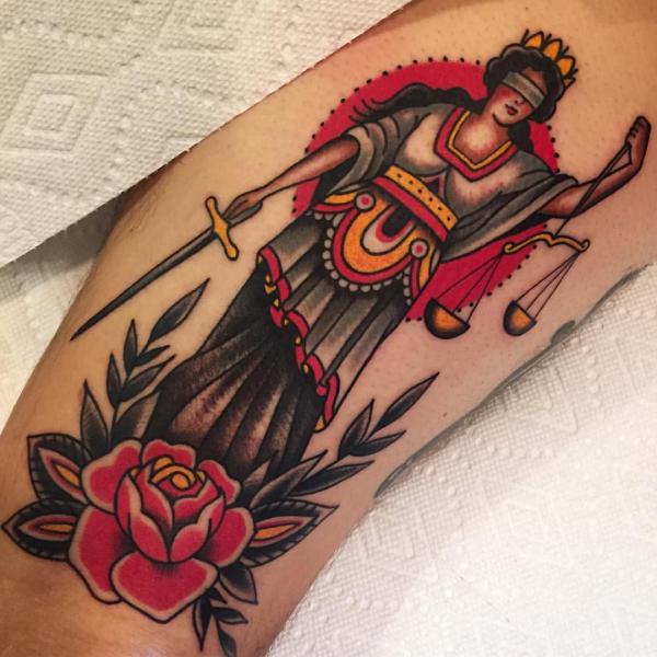 Goddess Themis with sword and scales of justice tattoo traditional