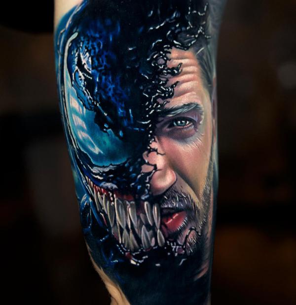Half venom half human face tattoo