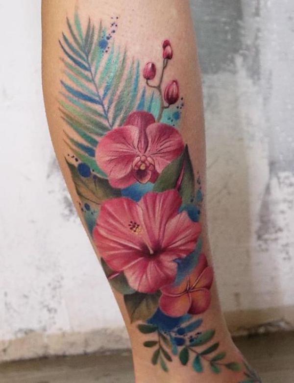Hibiscus and fern tattoo